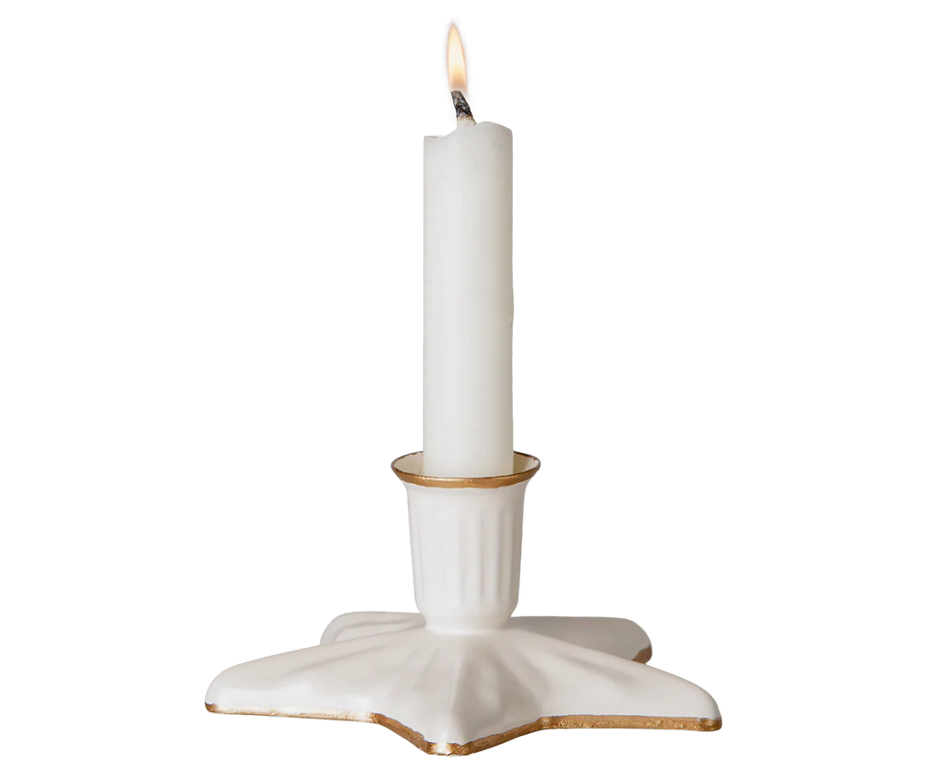 A white candle burns in the PRE-ORDER: Maileg Christmas Candle Holder, Star, Small (estimated arrival early September), with handpainted golden details, set against a plain light background.