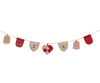 The PRE-ORDER: Maileg Christmas Garland (estimated arrival mid October) features red and beige fabric ornaments—bells, a heart, and patterned flags—on a string, making it the perfect festive touch for cozy holiday decor.
