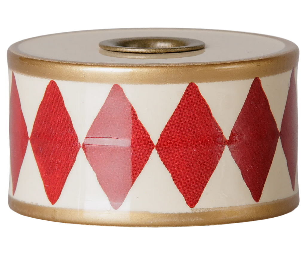 The PRE-ORDER: Maileg Christmas Candle Holder, Drum - Red/Off White (Estimated Arrival Mid October) features a charming cylindrical spool with red diamonds on white, gold borders, and a central top hole—a nostalgic Christmas decoration.