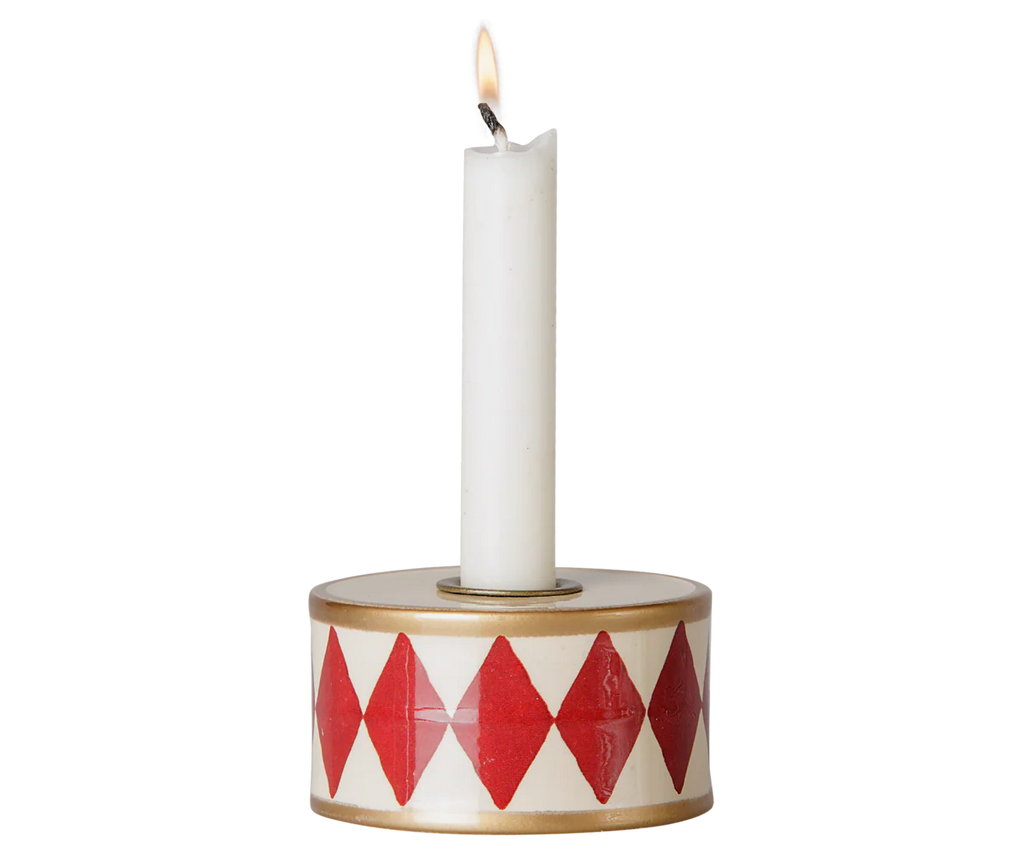 The PRE-ORDER: Maileg Christmas Candle Holder, Drum - Red/Off White features a white candle in a round holder decorated with red diamonds and gold trim—a festive accent for your Christmas decor. Estimated arrival mid October.