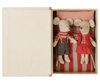 PRE-ORDER: Maileg Christmas Twin Mice—Little Sister in a red skirt and vest, Brother in overalls—rest on a striped mattress with bedding inside an open box shaped like a small bed. Estimated arrival: Early September.