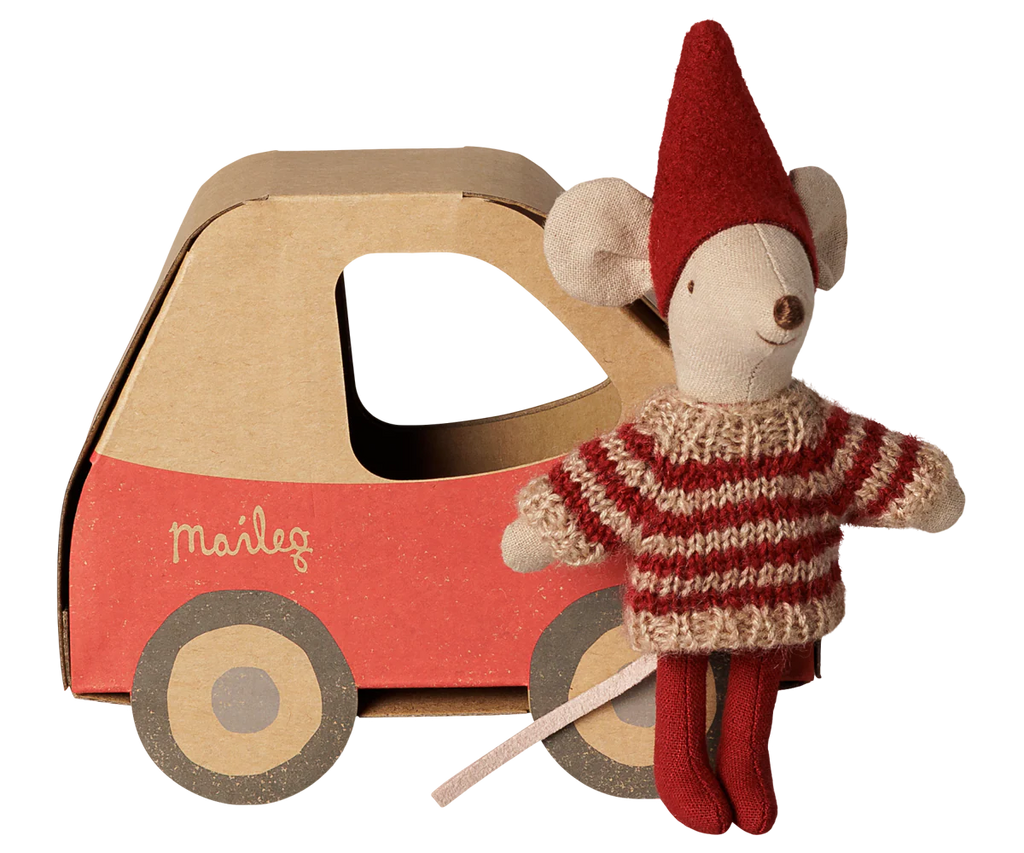 The PRE-ORDER: Maileg Christmas Mouse, Little Sister in Car Box features a festive mouse in a red hat, striped sweater, and red pants, packaged in a charming red and brown cardboard car box with "Maileg" on the side. Estimated arrival early November.