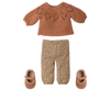 A cozy flat lay features a rust leaf-patterned sweater, beige pants with brown leafy print, matching rust shoes, and the PRE-ORDER: Maileg Bunny, Size 3 – Classic – Pants and Knitted Sweater (arriving early November).