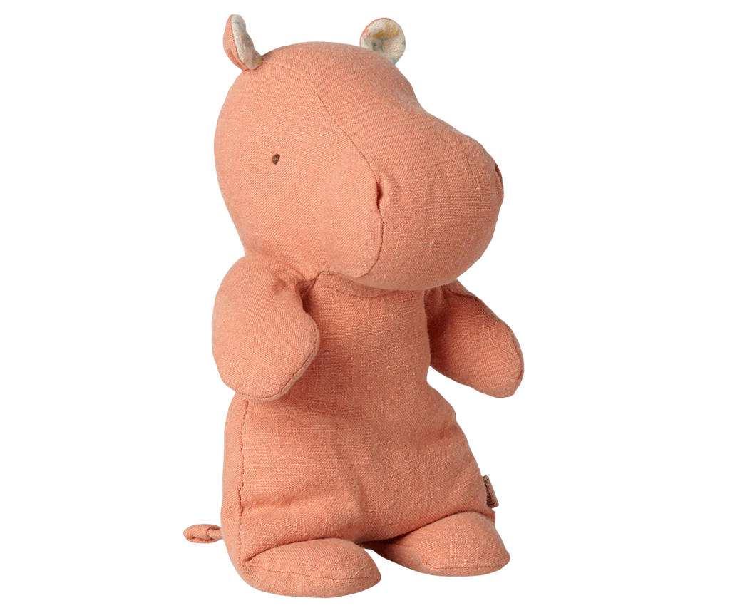 The PRE-ORDER: Maileg Safari Friends Hippo, Small – Dusty Coral, features a minimalist design with small black eyes and rounded ears, standing upright against a plain white background. Estimated arrival is early November.