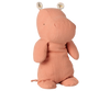 A PRE-ORDER: Maileg Safari Friends, Hippo, Medium - Dusty Coral stands upright with a charming minimalist design, small round patterned ears, and soft peach-toned fabric. Estimated arrival early November.