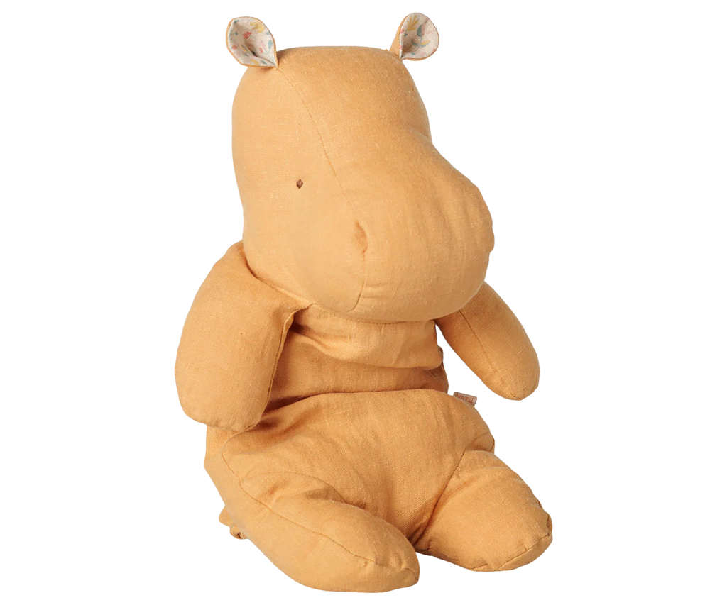The PRE-ORDER: Maileg Safari Friends, Hippo, Medium - Vintage Yellow is a soft plush toy with floral-patterned inner ears, featuring an upright sitting pose. Estimated arrival is early November.