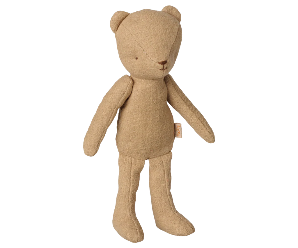 PRE-ORDER: Maileg Teddy Junior in Dark Sand—an adorable, light brown teddy bear with long arms and legs, crafted from soft cotton fabric and standing upright. Estimated arrival: Mid November.