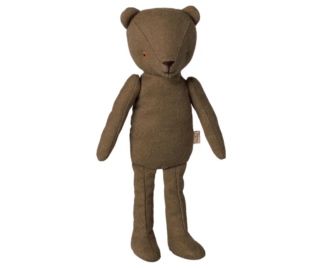 The PRE-ORDER: Maileg Teddy Dad - Ash Green features a vintage-style plush bear with simple stitched facial details, elongated limbs, and a side fabric tag, shown standing upright against a white background. Estimated arrival: Mid November.