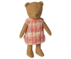 A brown teddy bear wears the PRE-ORDER: Maileg Dress, Teddy Junior - Coral (Estimated Arrival Early November), standing upright against a plain white background.