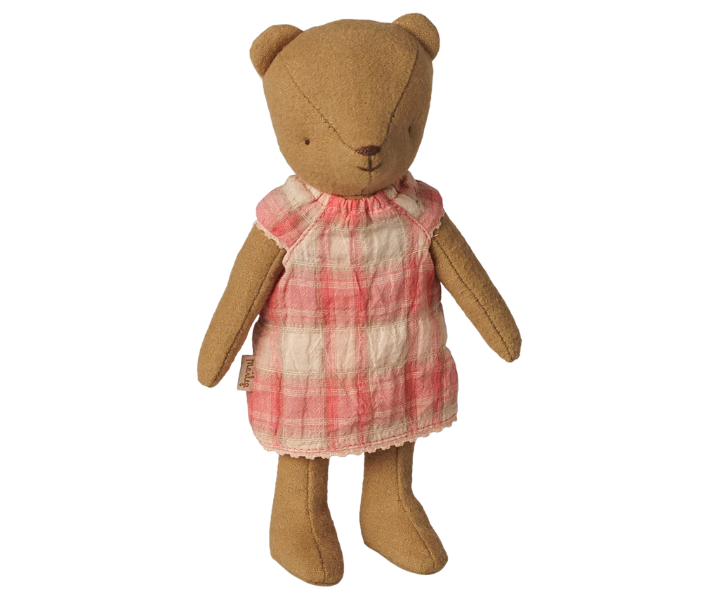 A brown teddy bear wears the PRE-ORDER: Maileg Dress, Teddy Junior - Coral (Estimated Arrival Early November), standing upright against a plain white background.