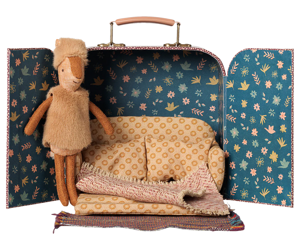 The PRE-ORDER: Maileg Reindeer in Suitcase, Little Sister (arriving early November) features a floral-lined suitcase with a plush reindeer, yellow couch, and blankets—creating a cozy miniature living room for imaginative play.
