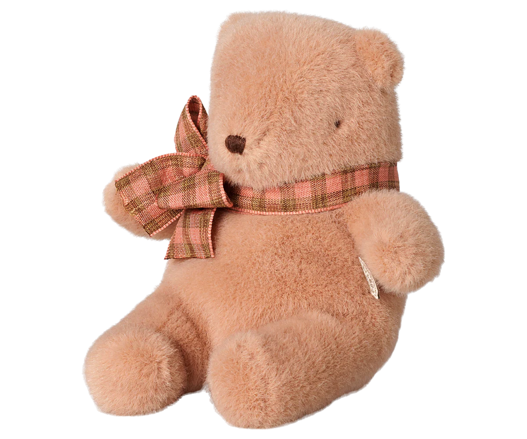 The PRE-ORDER: Maileg Teddy Bear Plush, Mini - Vintage Rose sits upright against a white background, featuring a soft vintage rose hue and fuzzy texture—an adorable stuffed animal perfect for cuddles. Estimated arrival early October.