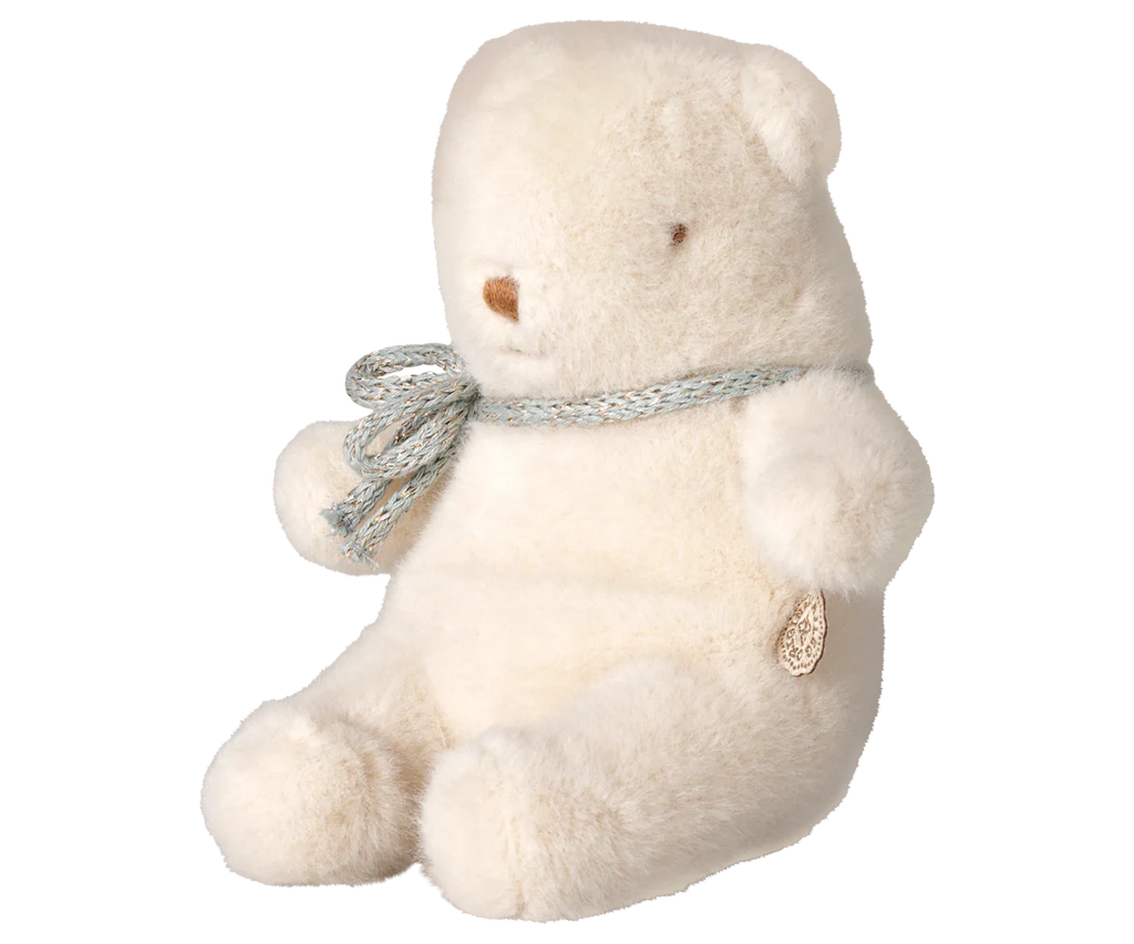 The PRE-ORDER: Maileg Teddy Bear Plush, Mini - Off White features a soft, upright plush bear wearing a light blue and gray knitted scarf, with small eyes and a stitched nose. Estimated arrival early October.