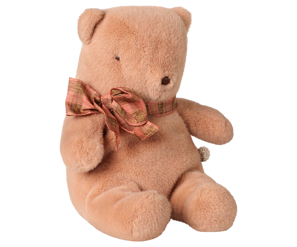 A PRE-ORDER Maileg Teddy Bear Plush, Small, in Vintage Rose sits upright against a plain white background. This soft, huggable bear features a classic, simple design and will arrive in early October.