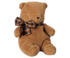 The PRE-ORDER: Maileg Teddy Bear Plush, Small - Mushroom (Estimated Arrival Early October) is a soft teddy bear with a gentle texture and plaid brown-and-black bow, sitting upright on a white background—a charming gift for all ages.