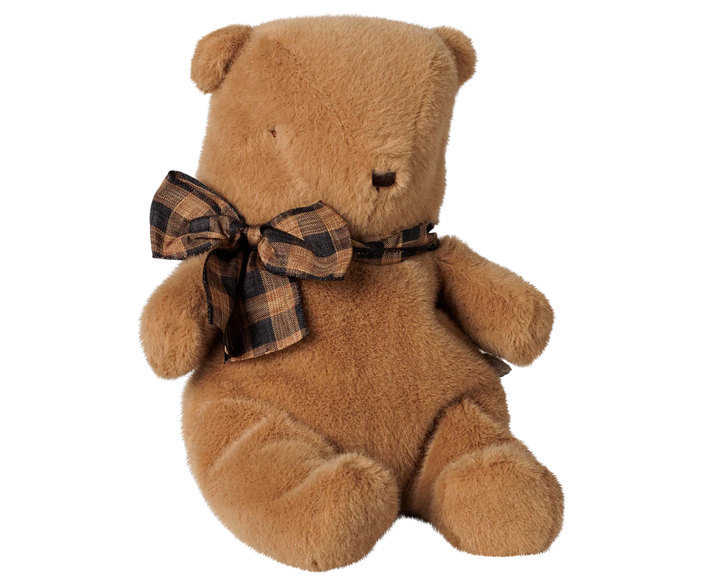 The PRE-ORDER: Maileg Teddy Bear Plush, Small - Mushroom (Estimated Arrival Early October) is a soft teddy bear with a gentle texture and plaid brown-and-black bow, sitting upright on a white background—a charming gift for all ages.