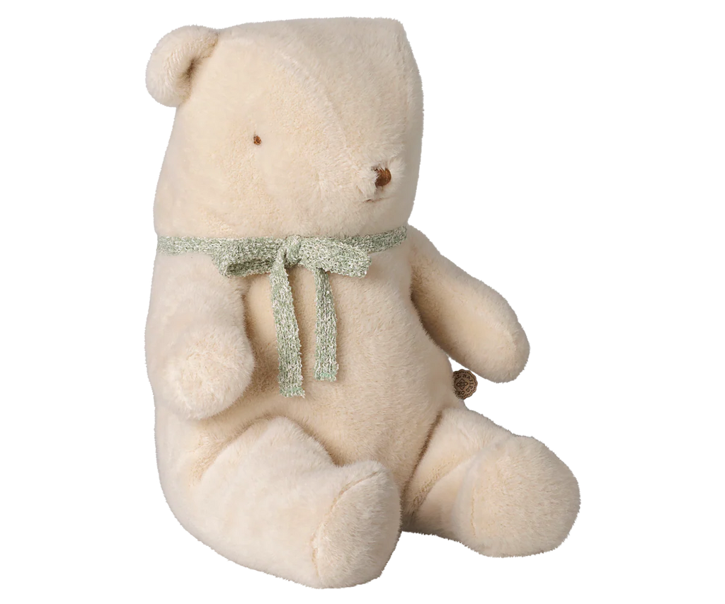 The PRE-ORDER: Maileg Teddy Bear Plush, Medium - Off White (Estimated Arrival Early October) is a soft, huggable bear with stitched eyes, a round nose, and a charming vintage look, featuring a light green bow around its neck.