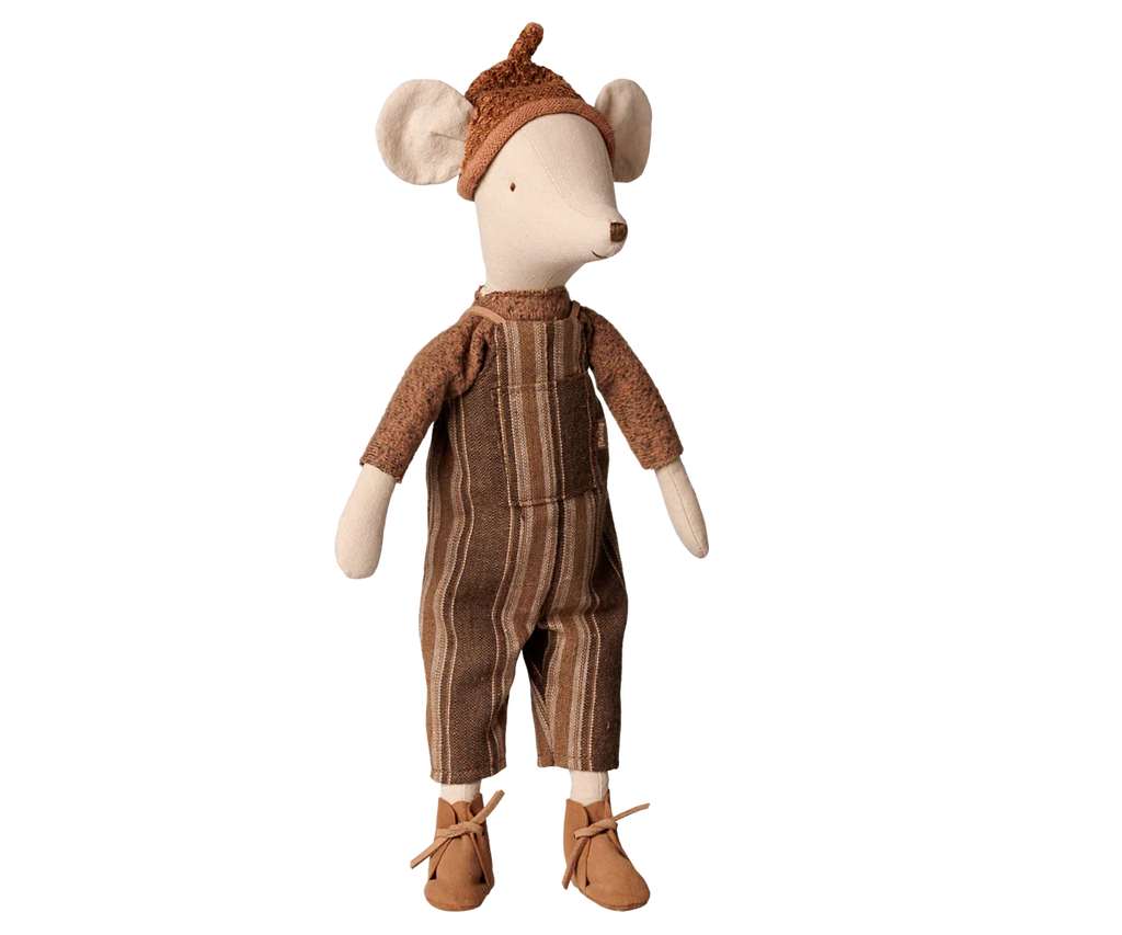 The PRE-ORDER: Maileg Mouse, Medium - Overall and Sweater stands upright on a plain light background, dressed in a soft cotton sweater, striped overalls, brown knit hat, and brown shoes. Estimated arrival early November.