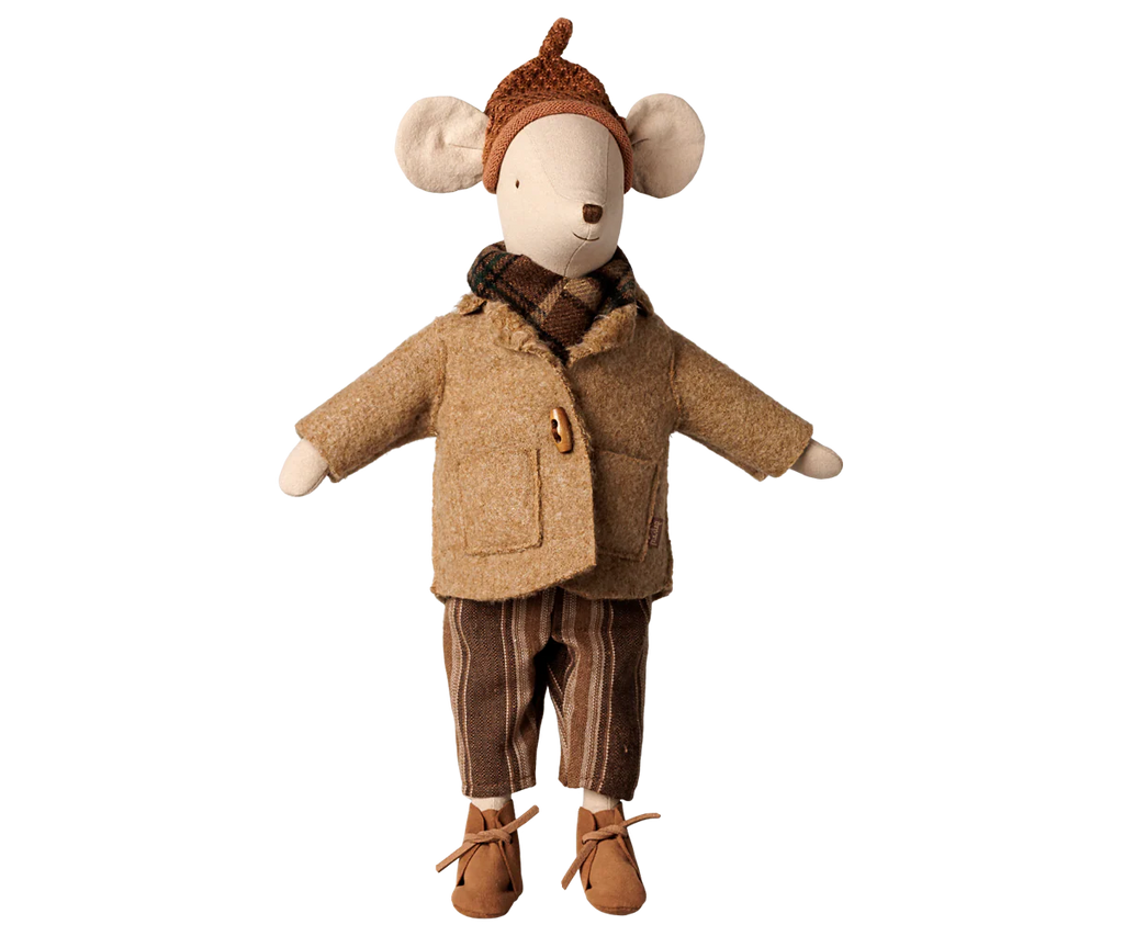 A Maileg medium mouse stands upright in a brown knit hat, plaid scarf, buttoned jacket, striped brown pants, and shoes. Outfit features the PRE-ORDER: Maileg Jacket and Scarf - Medium Mouse (Estimated Arrival Early November).
