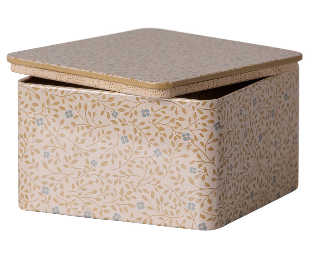 PRE-ORDER: Maileg Metal Box - Branches (Estimated Arrival Early October). This square, light-colored metal box features a delicate design of small blue flowers and yellow vines, and comes with a slightly open lid.