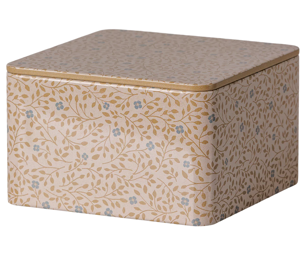 PRE-ORDER the Maileg Metal Box - Branches: a square tin with a beige background, gold vines, and blue flowers. Perfect as a stylish storage box. Estimated arrival early October.