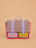 A Sticky Lemon School Bag from the Lemon Tree collection (Gingham Flower + Rose) is displayed against a plain beige background, featuring a colorful design with a checkered flap, purple straps, and front pockets in pink and yellow, all crafted from waterproof nylon.