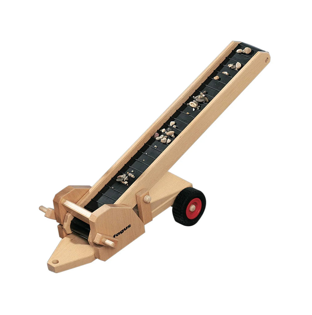 The Fagus Wooden Conveyor Belt features two wheels with red rims, a black rubber belt carrying small pebbles, and "Fagus" printed on the side—making it a classic piece for any Fagus vehicles collection.