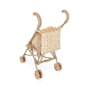A rear view of a beige Konges Sloejd Doll Stroller - Multi Star with four small double wheels and a cushioned seat. The fabric seat and backrest feature a colorful star pattern, complete with a secure harness. The handles are curved and padded. The stroller is positioned on a white background.