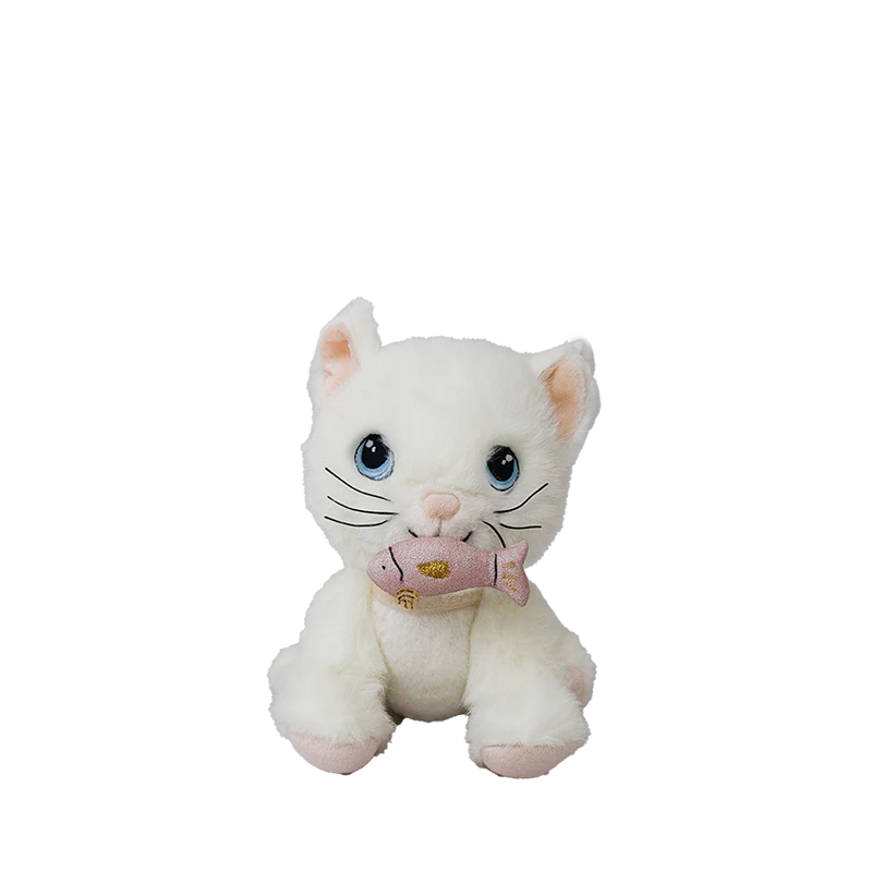 The Olli Ella Dinkum Cat Lux - White is a posable plush kitty with blue eyes and pink ears, sitting forward and holding a small magnetic fish accessory in its mouth.