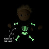 Olli Ella Dinky Dinkum Doll - Scully Skeleton plush wearing a black onesie with a glow-in-the-dark skeleton print and text that reads “Glows in the dark!”.