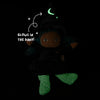 Olli Ella Dinky Dinkum Doll - Winnie Witch dressed in a glow-in-the-dark hat and striped stockings, with text that reads “GLOWS IN THE DARK!”.