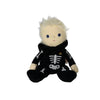 An Olli Ella Dinky Dinkum Doll - Scully Skeleton, a soft doll with light hair wearing a black hooded onesie featuring an embroidered white skeleton and a small rainbow.