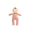 The Olli Ella Dozy Dinkum - Moppet is a soft cotton baby doll in a pink hooded onesie with a rainbow detail, closed eyes, and a light brown tuft of hair peeking out—adorably set against a plain white background.