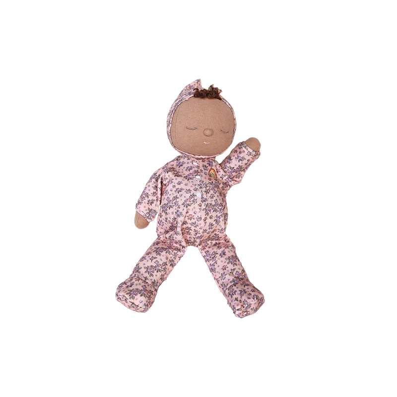 The Olli Ella Dozy Dinkum - Tootsie Briar is a soft fabric baby doll dressed in a floral-patterned outfit with a matching headband, featuring closed eyes and a peaceful expression.