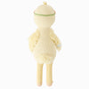 The Cuddle + Kind Duckling is a yellow, knitted plush toy shown from the back, standing upright with textured wings, long legs, a round tail, and a green head stripe—expertly crafted from 100% cotton yarn.