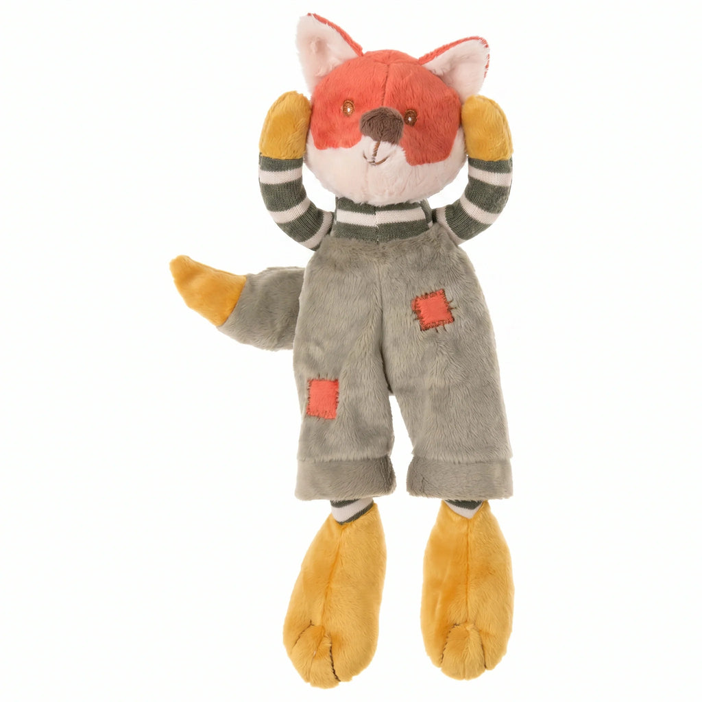 Bukowski - Foxy is a plush fox toy dressed in gray overalls with red patches, featuring orange paws, a striped tail, and striped sleeves. Shown on a white background, this soft toy offers infants a safe and cuddly stuffed animal companion.