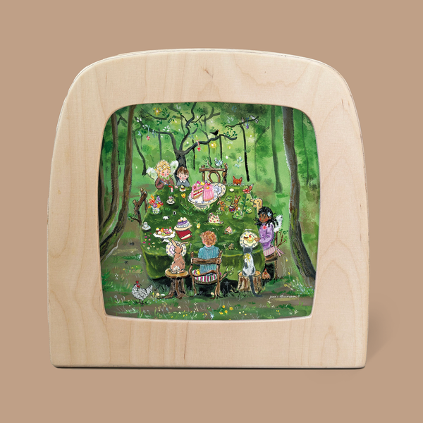 Silhouette Only - Forest Tea Party": A whimsical illustration in a wooden frame featuring children in vintage clothing enjoying cakes and treats at a forest tea party, with magical silhouettes of birds and animals joining the playful scene in lush greenery.