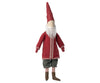A Maileg Small Santa toy wearing a red jacket, striped socks, and a pointy red hat designed as a decoration, isolated on a white background.