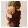 A young child in a textured brown sweater cuddles Snuggle Bunnies - Arthur the Bear, their faces nestled together in its ultra-soft plush.