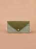 The Sticky Lemon Fanny Pack Small - Envelope - Tickling Grass is a rectangular pouch made from recycled PET bottles with a green snap flap, green and white checkered front, yellow sides, and shown on a plain beige background.