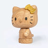 The Boyhood Hello Kitty 50th Anniversary Limited Edition features Hello Kitty with a gold bow on her left ear, black eyes, nose, and whiskers, standing against a plain light background.