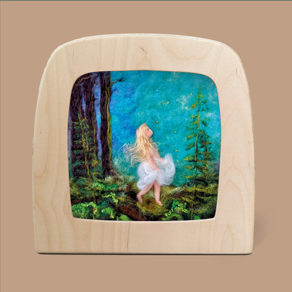 Introducing "Silhouette Only - Star Money for Toverlux Lamp," a captivating piece of art that adds a touch of elegance to home decor. This framed portrayal features a fairy-like figure with long blonde hair and a flowing white dress, set amidst an enchanting forest. Surrounded by towering trees, the artwork is illuminated by a glowing blue-green sky filled with magical fireflies, all beautifully encased in a light wooden frame.