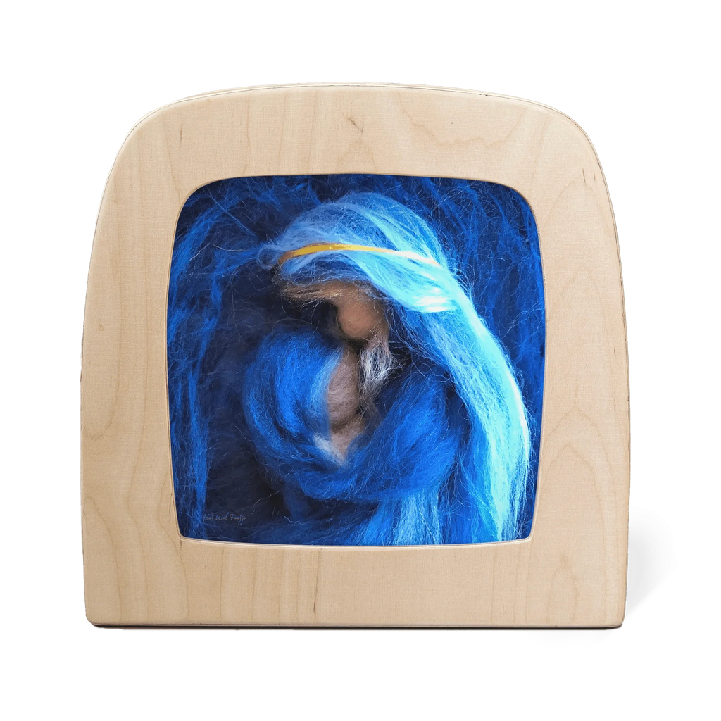 The Silhouette Only - Mary with Child for Toverlux Lamp features a delicate wooden frame displaying blue and white wool forming Mary and child—a dreamy, translucent decor piece that ships in one week.