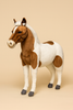 The Large Pony Stuffed Animal, 42'', stands upright with brown and white patches, a white mane, brown ears, and gray hooves. Part of the HANSA animals collection. FINAL SALE.