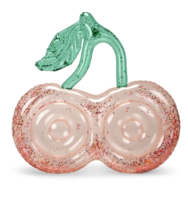 An Inflatable Cherry Float shaped like two cherries connected at the stem. The cherries are adorned with pink and red glitter, and the green stem and leaf also contain green glitter. Perfect for shallow water, this toy adds a splash of fun, but remember it requires adult supervision for safe play.