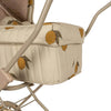 Close-up of the Doll Pram - Grand Lemon, showcasing a vintage-style design with fabric featuring orange fruit motifs on a beige background. Made from organic cotton, the stroller's handle and frame are light beige, beautifully complementing the fabric pattern.