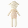 Cuddle + Kind Lucy the Lamb is a hypoallergenic stuffed animal in cream and beige with small pastel polka dots on its back, shown from behind. It features a textured head and floppy ears for extra charm.