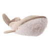 The Bukowski - Olympus Whale slipper, in soft beige and white, is shaped like a whale with a plush toy appearance, featuring a fluffy textured underside and shown from the front at a slight angle.