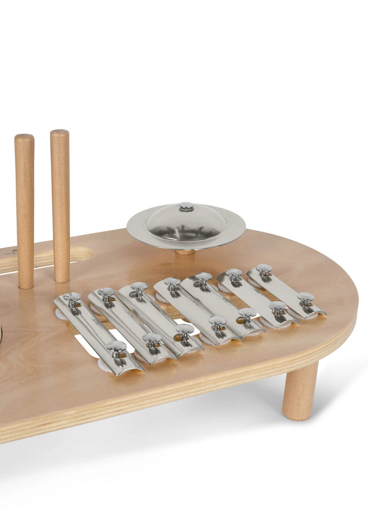 The Konges Sløjd - Wooden Music Board is crafted from FSC-certified plywood and includes a xylophone with metal keys, a small metal cymbal, and two wooden mallets on a sturdy base. It's designed for easy play and sound exploration, making it ideal for aspiring musicians.