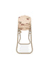 The Konges Sloejd High Chair - Cherry Glitter is a vintage-style folding chair that resembles a foldable high chair. It features an embroidered cherry design on its beige fabric seat and backrest. The metal-framed chair is perfectly sized as a charming doll accessory, showcased against a white background.